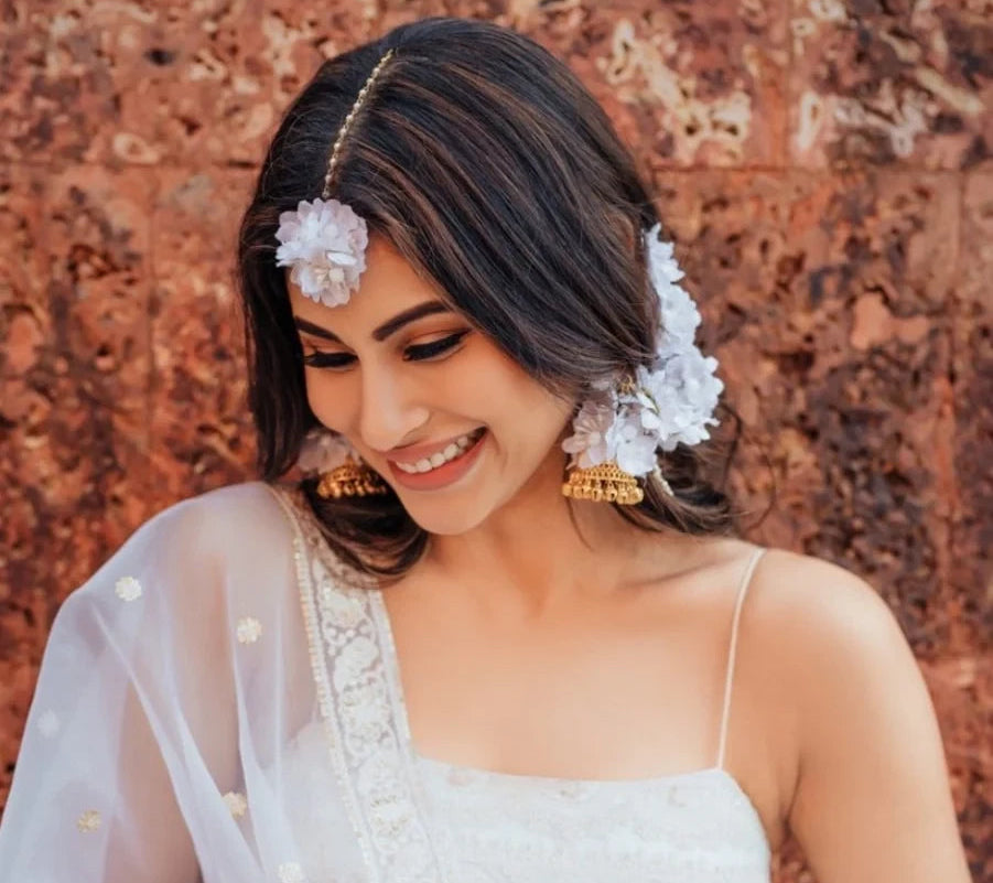mouni roy nagin actor in prune floral jewelry on her wedding 