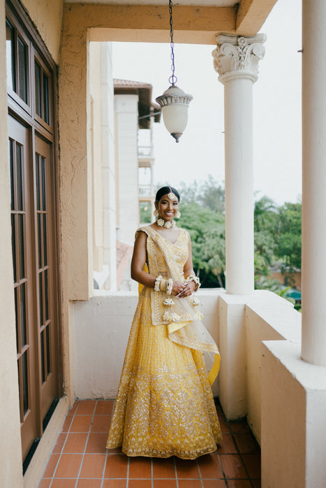 Real bride inspiration featuring the Meher three-flower choker and statement maang tikka.