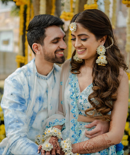 Pair of designer floral haath phools from the Noor-ul-Ain collection styled by a real bride.