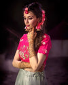 indian television star wearing pink handcrafted floral jewelry at her haldi 