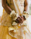 Real bride inspiration featuring the Meher three-flower choker and statement maang tikka.