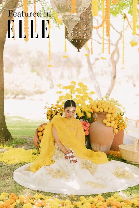 eal bride in ELLE wearing Prune India Jhumkas Earrings and Signature Silk set.
