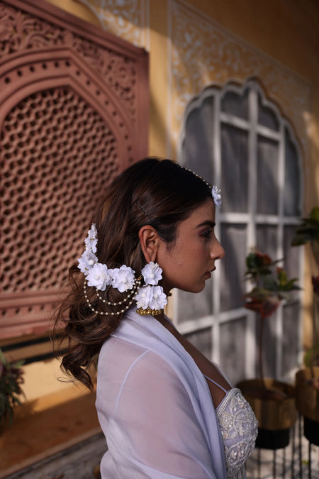 Handcrafted white floral kaleere with Haath Phool and Kaanchain Jhumkas.