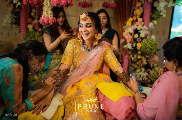 ethnic floral maang tikka paired with jhumkas earrings for weddings