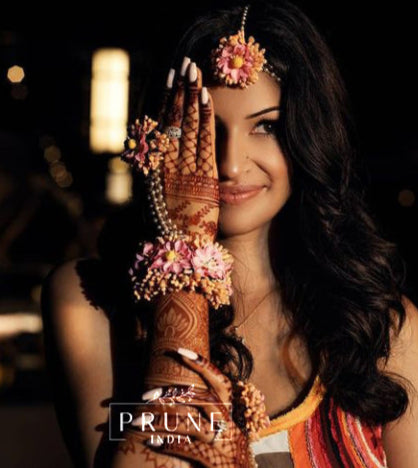 Inspired by her stunning look at her destination wedding Welcome Party in Mexico