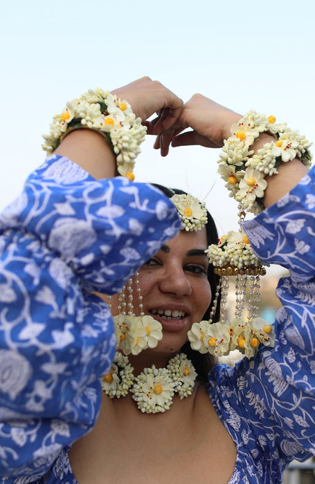 Prune India Founder showcasing the three-flower ivory floral choker and statement maang tikka.