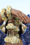 10-piece sustainable ivory floral jewelry set including bangles and earrings, Founder's Signature Edition.